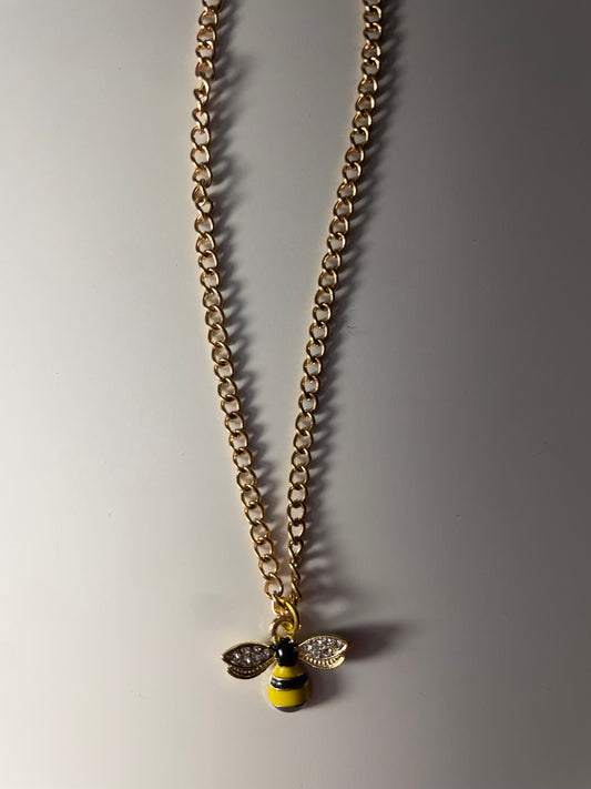 Honeycomb and bee necklaces